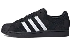 Atmos x Adidas Originals Superstar Recouture Patchwork sneakers, black/white