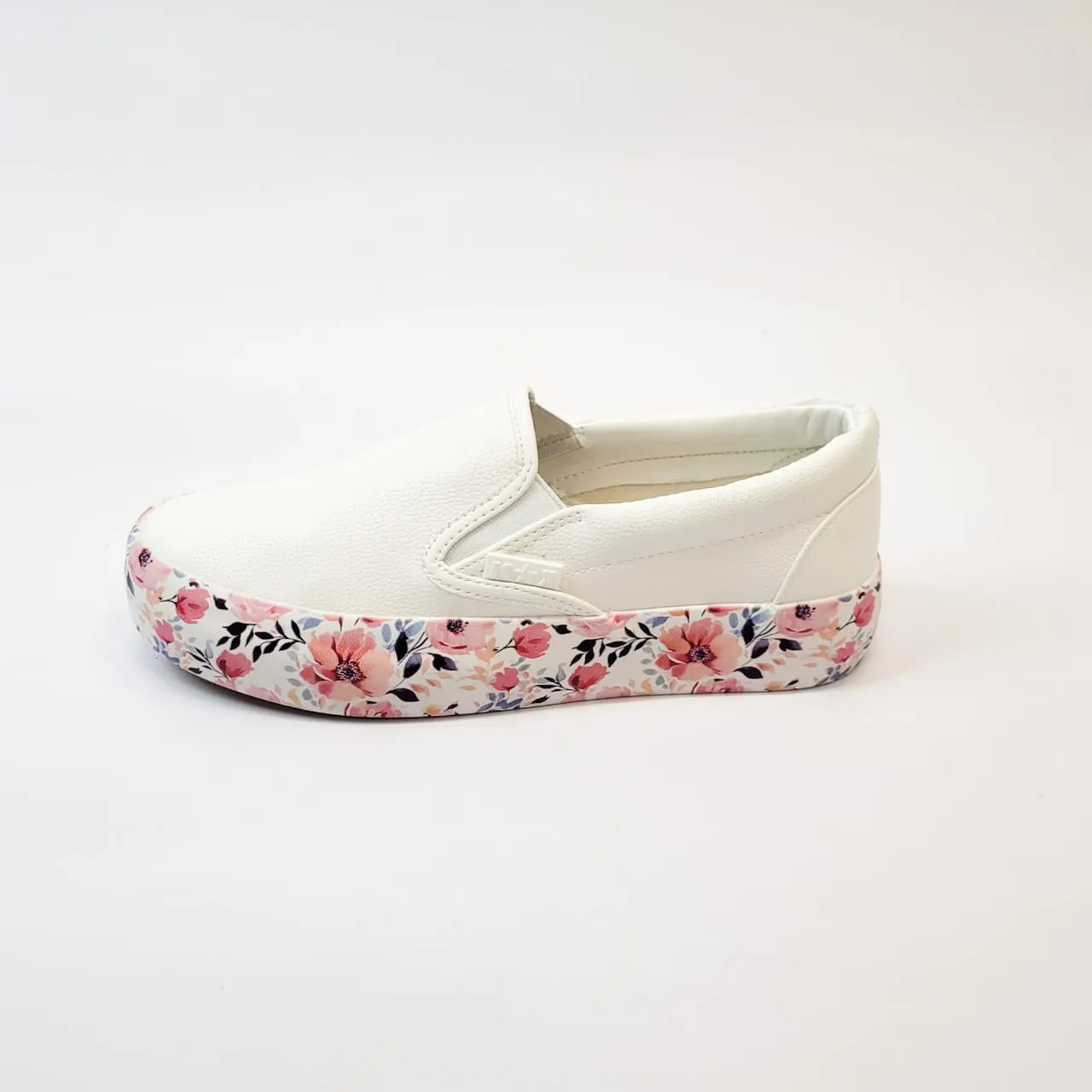 K7 Emmi white slip on with flower platform